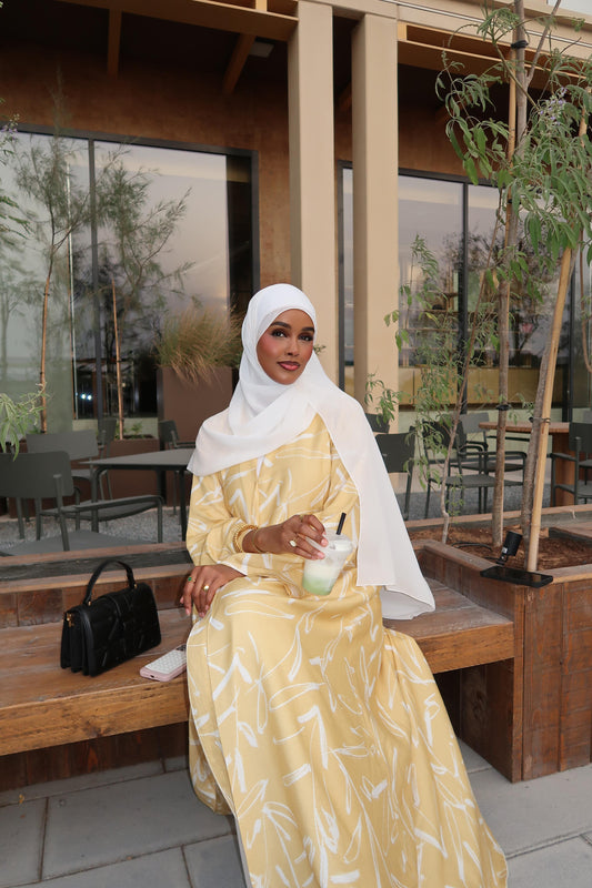 Butter yellow Abaya with a white hijab for summer - Aeko Collection 