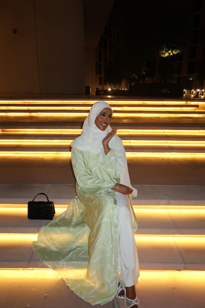 Mint Green Linen Abaya in size 60, flowy modest design, perfect for warm weather