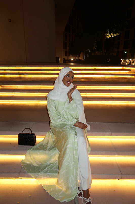 Mint Green Linen Abaya in size 60, flowy modest design, perfect for warm weather